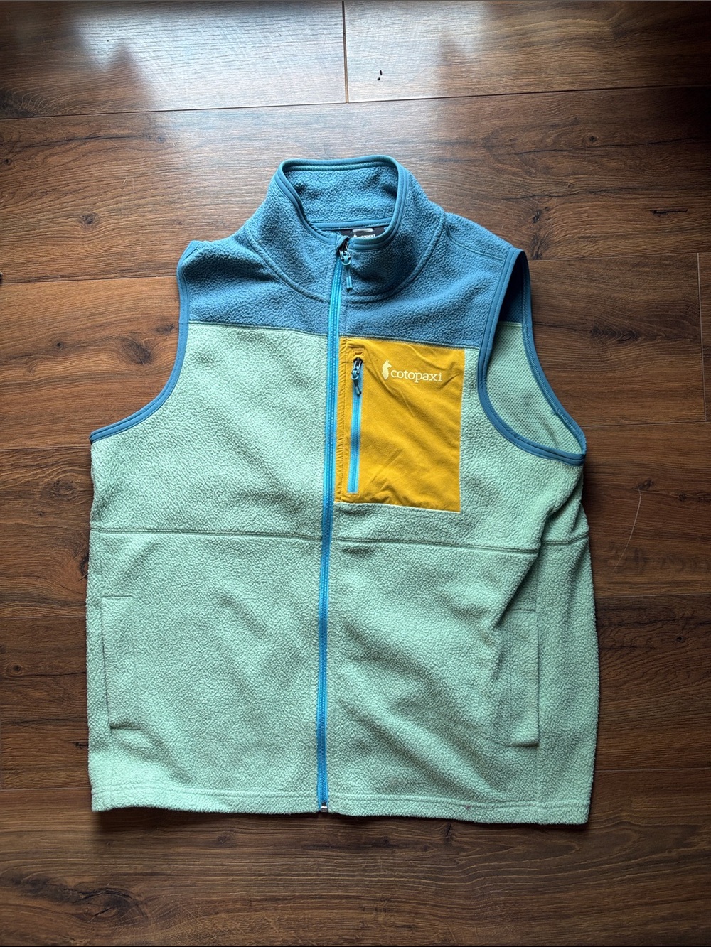 Cotopaxi Colorblock Fleece Vest in Aqua, Sky Blue & Mustard